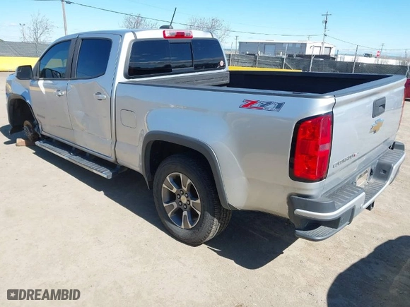 2019 Chevrolet Colorado 4WD Z71 with VIN 1GCGTDEN2K1146043, listed as a IAAI auction lot 41712002 with 84,034 mi miles. Bid and sale history available at carsss.com. Image 3.