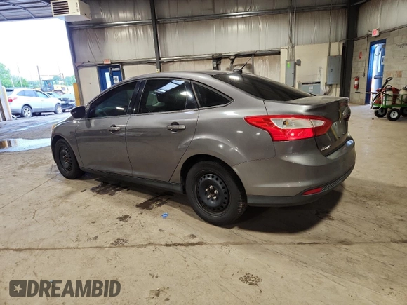 2012 Ford Focus SE with VIN 1FAHP3F28CL208855, listed as a Copart auction lot 63766165 with 168,183 mi miles and Salvage title. Bid and sale history available at DreamBid. Image 2.