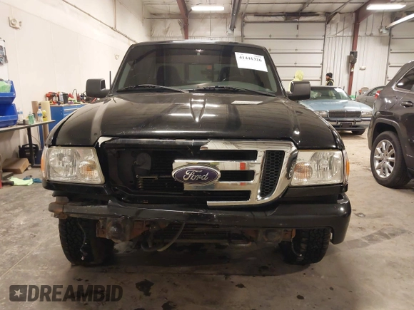 2009 Ford Ranger XLT with VIN 1FTZR45E79PA63934, listed as a IAAI auction lot 41441326 with 153,140 mi miles. Bid and sale history available at carsss.com. Image 13.