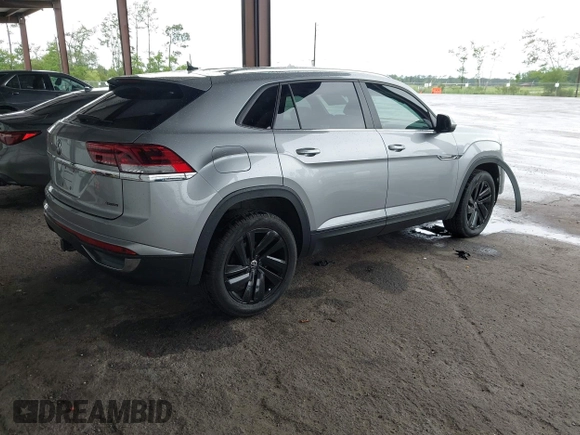 2023 Volkswagen Atlas SE z VIN 1V2HE2CA0PC222291, wystawiony jako IAAI lot #42431536 z przebiegiem 23 114 mil mil oraz . Historia ofert i sprzedaży dostępna na DreamBid. Obrazek 4.