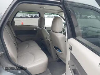 2009 Mercury Mariner Premier z VIN 4M2CU87759KJ17765, wystawiony jako IAAI lot #42354423 z przebiegiem 163 907 mil mil oraz . Historia ofert i sprzedaży dostępna na DreamBid. Obrazek 8.