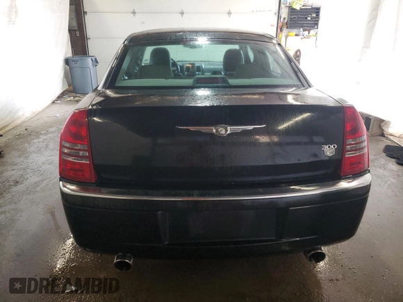 2005 Chrysler 300 with VIN 2C3JA63HX5H501958, listed as a Copart auction lot 52676825 with 119,395 mi miles and Salvage Title. Bid and sale history available at carsss.com. Image 6.
