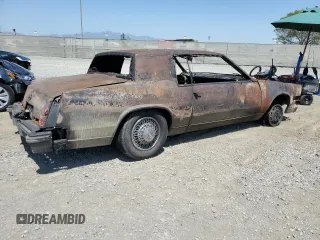 1979 Cadillac Eldorado z VIN 6L57B9E638130, wystawiony jako Copart lot #56873134 z przebiegiem Nie podano mil oraz Nie do naprawy • Non repairable. Historia ofert i sprzedaży dostępna na DreamBid. Obrazek 3.