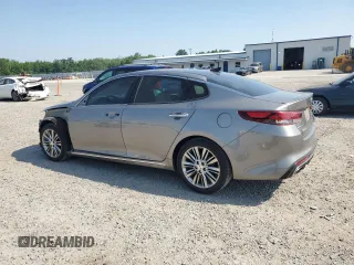 2016 Kia Optima SXL Turbo with VIN 5XXGV4L22GG066837, listed as a Copart auction lot 60989355 with 100,926 mi miles and Salvage title. Bid and sale history available at DreamBid. Image 2.