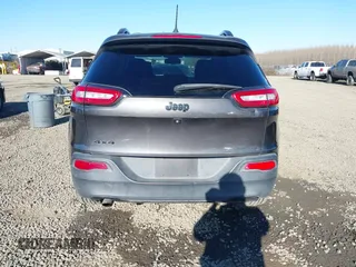 2014 Jeep Cherokee Latitude with VIN 1C4PJMCB5EW294631, listed as a IAAI auction lot 41453628 with 127,847 mi miles and . Bid and sale history available at DreamBid. Image 17.