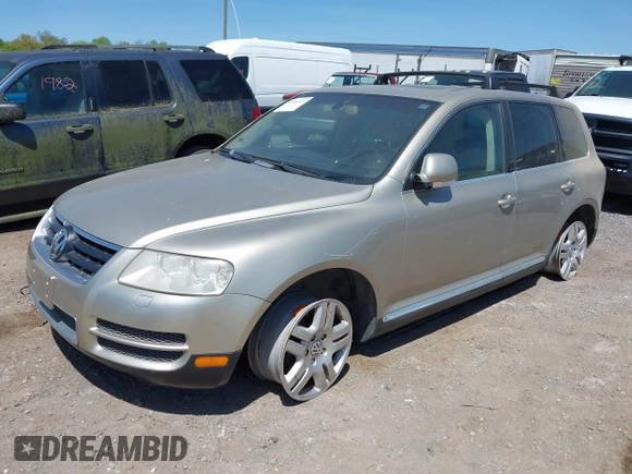 2004 Volkswagen Touareg with VIN WVGCM67L44D033856, listed as a IAAI auction lot 42142143 with 105,682 mi miles and . Bid and sale history available at DreamBid. Image 2.