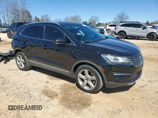 2015 Lincoln MKC with VIN 5LMCJ2A91FUJ33265, listed as a Copart auction lot 49712835 with 144,723 mi miles and Salvage Title. Bid and sale history available at DreamBid. Image 4.