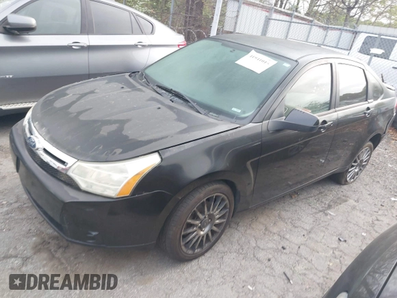 2010 Ford Focus SES with VIN 1FAHP3GN6AW298446, listed as a IAAI auction lot 41941015 with 184,377 mi miles. Bid and sale history available at carsss.com. Image 2.