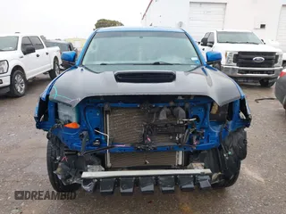 2016 Toyota Tacoma SR with VIN 5TFCZ5AN4GX013233, listed as a IAAI auction lot 41394610 with 142,099 mi miles and . Bid and sale history available at DreamBid. Image 12.