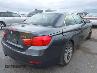 2015 BMW 4 Series 428i with VIN WBA3V7C54FP772531, listed as a IAAI auction lot 41487899 with 90,893 mi miles. Bid and sale history available at carsss.com. Image 4.