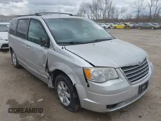 2010 Chrysler Town & Country Touring with VIN 2A4RR5D1XAR195748, listed as a IAAI auction lot 42029882 with 136,905 mi miles. Bid and sale history available at carsss.com. Image 1.
