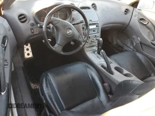 2000 Toyota Celica GTS with VIN JTDDY38T5Y0001554, listed as a Copart auction lot 82463124 with 113,433 mi miles and Salvage Title. Bid and sale history available at carsss.com. Image 8.