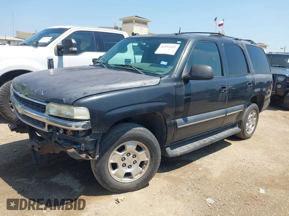 2004 Chevrolet Tahoe LS with VIN 1GNEC13T04R156427, listed as a IAAI auction lot 42333312 with 303,040 mi miles and . Bid and sale history available at DreamBid. Image 2.