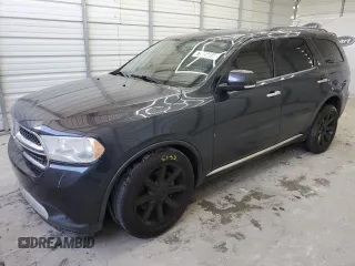 2013 Dodge Durango Crew with VIN 1C4SDHDT0DC539562, listed as a Copart auction lot 77016244 with 157,701 mi miles and Clean Title. Bid and sale history available at carsss.com. Image 1.