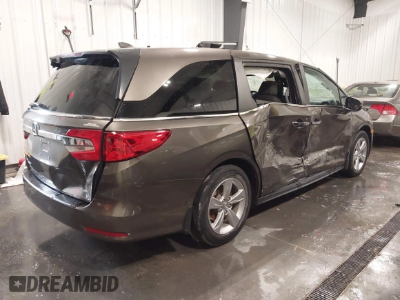 2019 Honda Odyssey EX-L with VIN 5FNRL6H73KB135075, listed as a IAAI auction lot 41908515 with 61,426 mi miles. Bid and sale history available at carsss.com. Image 4.