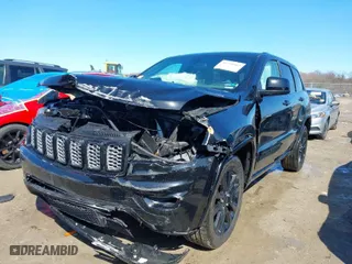 2021 Jeep Grand Cherokee Freedom with VIN 1C4RJFAG5MC704072, listed as a IAAI auction lot 41928963 with 65,073 mi miles. Bid and sale history available at carsss.com. Image 2.