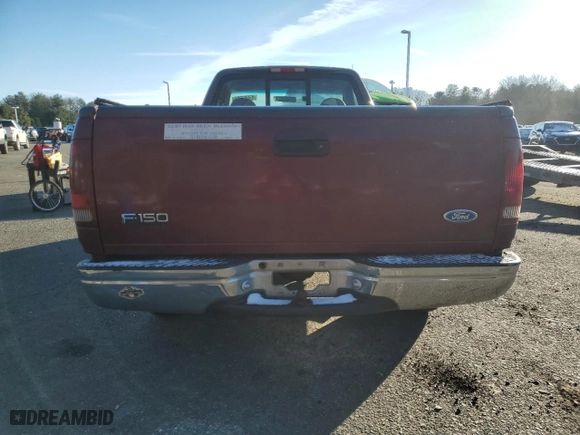 1997 Ford F-150 Standard with VIN 1FTDF1721VNA54544, listed as a Copart auction lot 85661394 with 221,536 mi miles and Salvage Title. Bid and sale history available at carsss.com. Image 6.