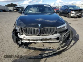 2019 BMW 5 Series 530i with VIN WBAJA5C59KWA58193, listed as a Copart auction lot 44623275 with 115,573 mi miles and Salvage Title. Bid and sale history available at DreamBid. Image 5.