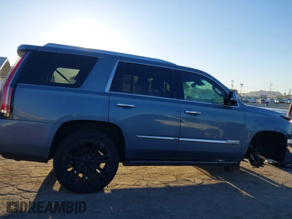 2016 Cadillac Escalade Premium Collection z VIN 1GYS4CKJ5GR382840, wystawiony jako IAAI lot #41824950 z przebiegiem 235 931 mil mil oraz . Historia ofert i sprzedaży dostępna na DreamBid. Obrazek 14.