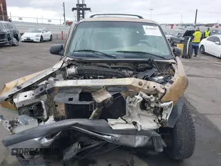1998 Ford Explorer with VIN 1FMZU32X1WZA93411, listed as a IAAI auction lot 41368427 with 237,756 mi miles and . Bid and sale history available at DreamBid. Image 13.