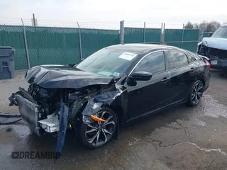 2017 Honda Civic Sedan Si with VIN 2HGFC1E54HH701127, listed as a IAAI auction lot 41845336 with 140,150 mi miles. Bid and sale history available at carsss.com. Image 2.