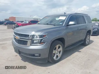2019 Chevrolet Tahoe LT z VIN 1GNSCBKC8KR406519, wystawiony jako IAAI lot #42145021 z przebiegiem 74 694 mil mil oraz . Historia ofert i sprzedaży dostępna na DreamBid. Obrazek 17.