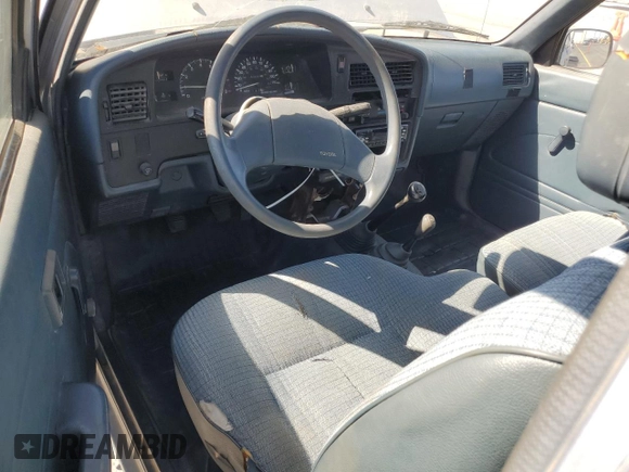 1991 Toyota Pickup z VIN JT4RN13PXM6031833, wystawiony jako Copart lot #58953095 z przebiegiem 252 237 mil mil oraz Czysty tytuł • Clean title. Historia ofert i sprzedaży dostępna na DreamBid. Obrazek 8.