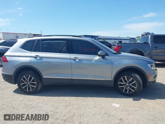 2020 Volkswagen Tiguan SE with VIN 3VV3B7AX8LM077472, listed as a IAAI auction lot 41933521 with 52,028 mi miles and . Bid and sale history available at DreamBid. Image 13.