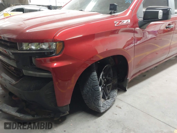 2021 Chevrolet Silverado 1500 LT Trail Boss with VIN 1GCPYFED8MZ167911, listed as a IAAI auction lot 41732808 with 34,903 mi miles and . Bid and sale history available at DreamBid. Image 6.