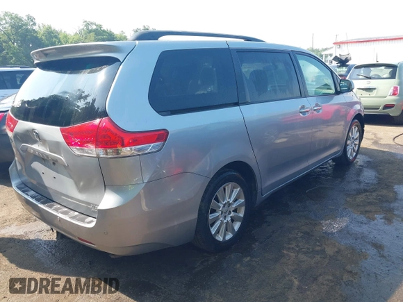 2014 Toyota Sienna Limited with VIN 5TDDK3DC0ES087274, listed as a IAAI auction lot 42478942 with 102,265 mi miles and . Bid and sale history available at DreamBid. Image 4.