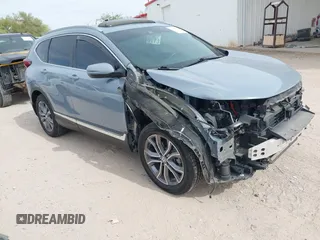 2020 Honda CR-V Touring z VIN 7FART6H99LE012081, wystawiony jako IAAI lot #42350064 z przebiegiem 46 570 mil mil oraz . Historia ofert i sprzedaży dostępna na DreamBid. Obrazek 1.