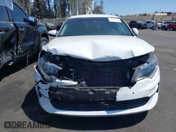 2016 Kia Optima LX with VIN 5XXGT4L37GG121295, listed as a IAAI auction lot 41922348 with 82,238 mi miles. Bid and sale history available at carsss.com. Image 13.