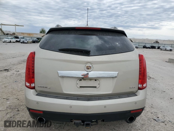 2015 Cadillac SRX Luxury Collection z VIN 3GYFNEE33FS606531, wystawiony jako Copart lot #53088485 z przebiegiem 115 140 mil mil oraz Szkody całkowita. Historia ofert i sprzedaży dostępna na DreamBid. Obrazek 6.