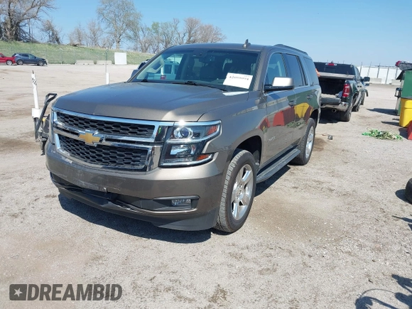 2016 Chevrolet Tahoe LT with VIN 1GNSKBKC9GR434579, listed as a IAAI auction lot 42080094 with 137,910 mi miles and . Bid and sale history available at DreamBid. Image 2.