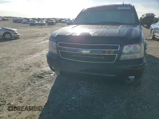 2009 Chevrolet Suburban 2LT z VIN 1GNFC26069R297182, wystawiony jako Copart lot #84915294 z przebiegiem 221 946 mil mil oraz Szkoda całkowita • Salvage title. Historia ofert i sprzedaży dostępna na DreamBid. Obrazek 11.