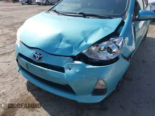 2013 Toyota Prius One with VIN JTDKDTB38D1037187, listed as a IAAI auction lot 42152202 with 157,413 mi miles and . Bid and sale history available at DreamBid. Image 6.