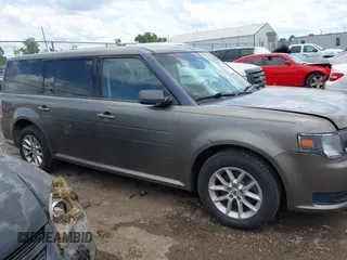 2014 Ford Flex SE z VIN 2FMGK5B81EBD02360, wystawiony jako IAAI lot #42383070 z przebiegiem 173 643 mil mil oraz . Historia ofert i sprzedaży dostępna na DreamBid. Obrazek 13.