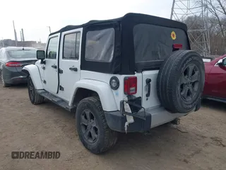 2014 Jeep Wrangler Unlimited Sahara with VIN 1C4BJWEGXEL326585, listed as a IAAI auction lot 41712047 with 155,973 mi miles. Bid and sale history available at carsss.com. Image 3.