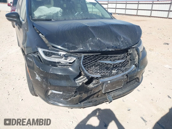 2023 Chrysler Pacifica Hybrid Touring L with VIN 2C4RC1L75PR611901, listed as a IAAI auction lot 41510935 with 44,156 mi miles and . Bid and sale history available at DreamBid. Image 6.