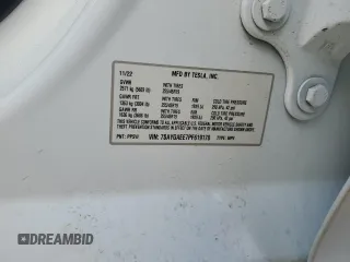2023 Tesla Model Y Long Range with VIN 7SAYGAEE7PF619170, listed as a Copart auction lot 47647585 with 35,674 mi miles and Salvage Title. Bid and sale history available at DreamBid. Image 13.