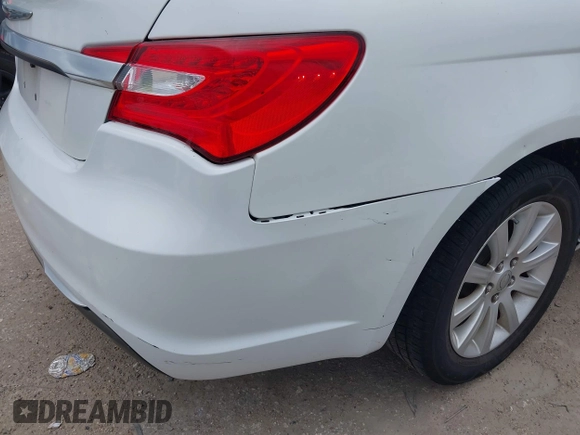 2013 Chrysler 200 Touring with VIN 1C3CCBBB6DN693975, listed as a IAAI auction lot 42137676 with 114,360 mi miles and . Bid and sale history available at DreamBid. Image 13.