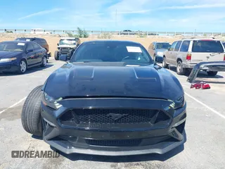 2021 Ford Mustang GT z VIN 1FA6P8CF4M5149580, wystawiony jako IAAI lot #41878355 z przebiegiem 60 028 mil mil oraz . Historia ofert i sprzedaży dostępna na DreamBid. Obrazek 12.