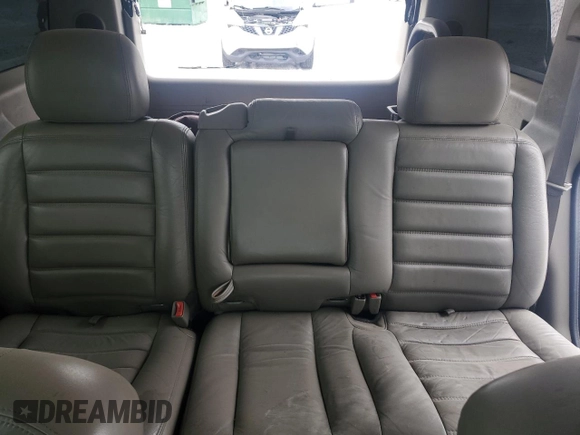 2004 Hummer H2 z VIN 5GRGN23U74H100175, wystawiony jako Copart lot #52642125 z przebiegiem 112 305 mil mil oraz Szkoda całkowita • Salvage title. Historia ofert i sprzedaży dostępna na DreamBid. Obrazek 10.
