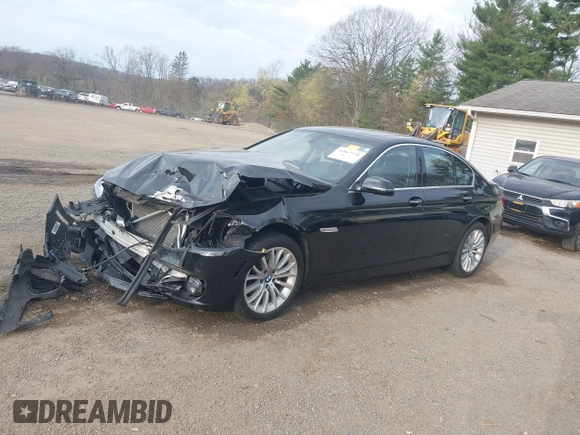 2014 BMW 5 Series 528i xDrive with VIN WBA5A7C52ED616976, listed as a IAAI auction lot 42067334 with 98,286 mi miles and . Bid and sale history available at DreamBid. Image 2.