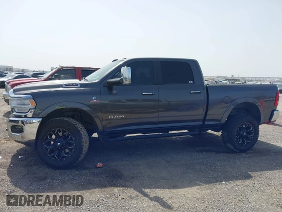 2019 Ram 2500 Laramie with VIN 3C6UR5FL2KG630341, listed as a IAAI auction lot 41742788 with 95,292 mi miles and . Bid and sale history available at DreamBid. Image 14.