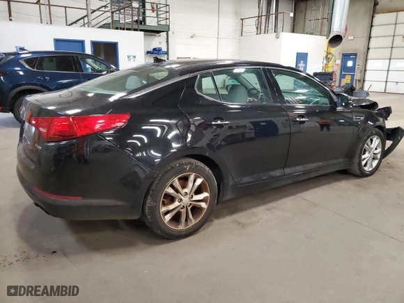 2013 Kia Optima EX with VIN 5XXGN4A72DG131003, listed as a Copart auction lot 51860065 with 197,296 mi miles and Salvage Title. Bid and sale history available at carsss.com. Image 3.