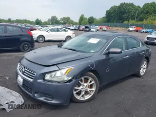 2013 Nissan Maxima SV with VIN 1N4AA5AP8DC806396, listed as a IAAI auction lot 39946999 with 141,665 mi miles and . Bid and sale history available at DreamBid. Image 2.