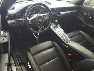 2018 Porsche 911 Carrera z VIN WP0AA2A93JS105437, wystawiony jako Copart lot #78437934 z przebiegiem Nie podano mil oraz Szkoda całkowita • Salvage title. Historia ofert i sprzedaży dostępna na DreamBid. Obrazek 8.
