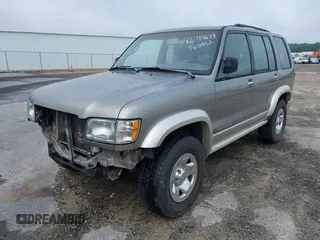 2002 Isuzu Trooper S with VIN JACDJ58X527J07745, listed as a IAAI auction lot 42714673 with 122,482 mi miles and . Bid and sale history available at DreamBid. Image 2.