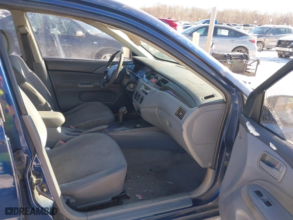 2003 Mitsubishi Lancer ES with VIN JA3AJ26E13U0A3996, listed as a IAAI auction lot 41251250 with 223,311 mi miles. Bid and sale history available at carsss.com. Image 5.